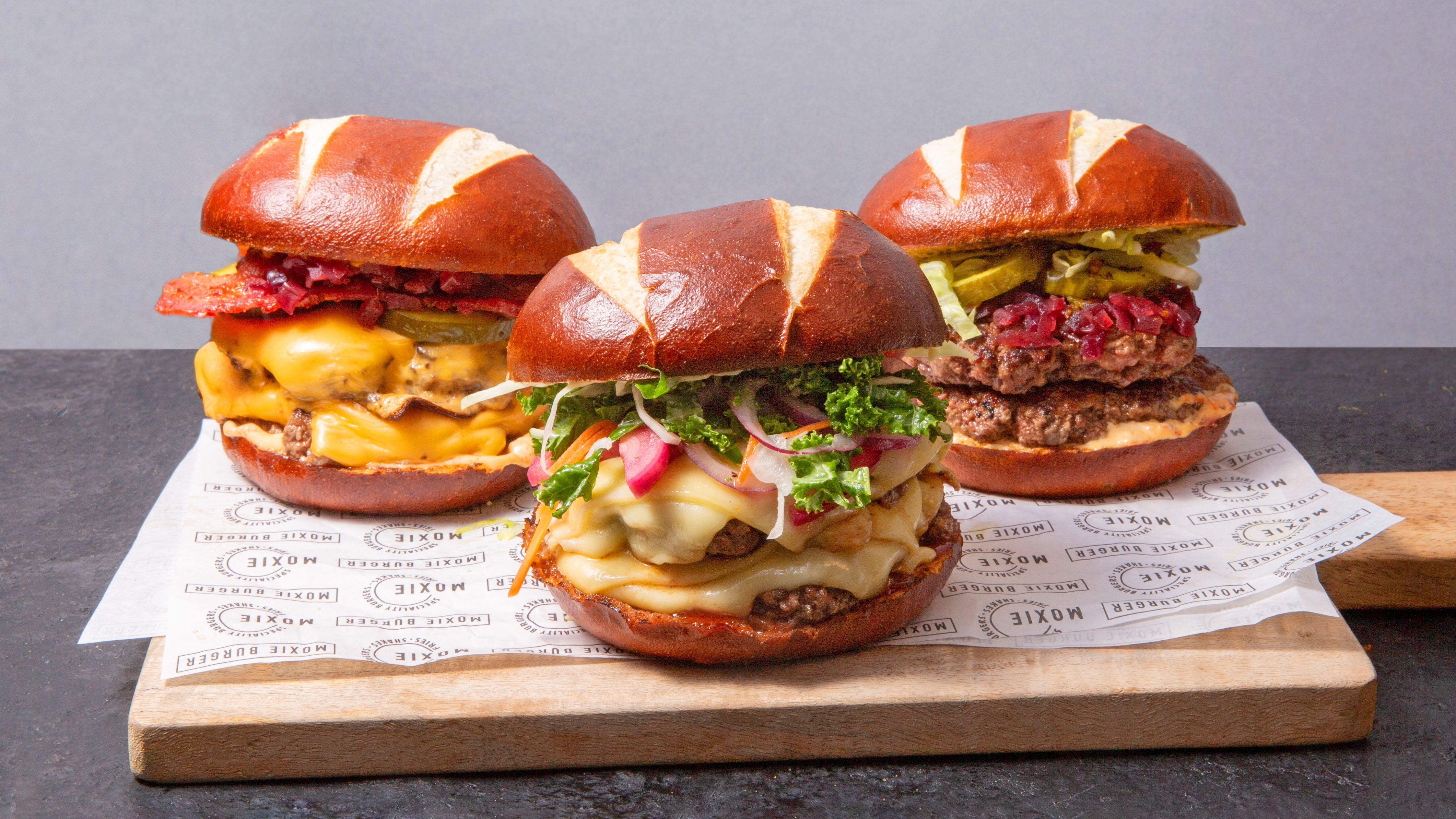 Moxie Burger Home of the Pretzel Bun! delivery from Harringay Order