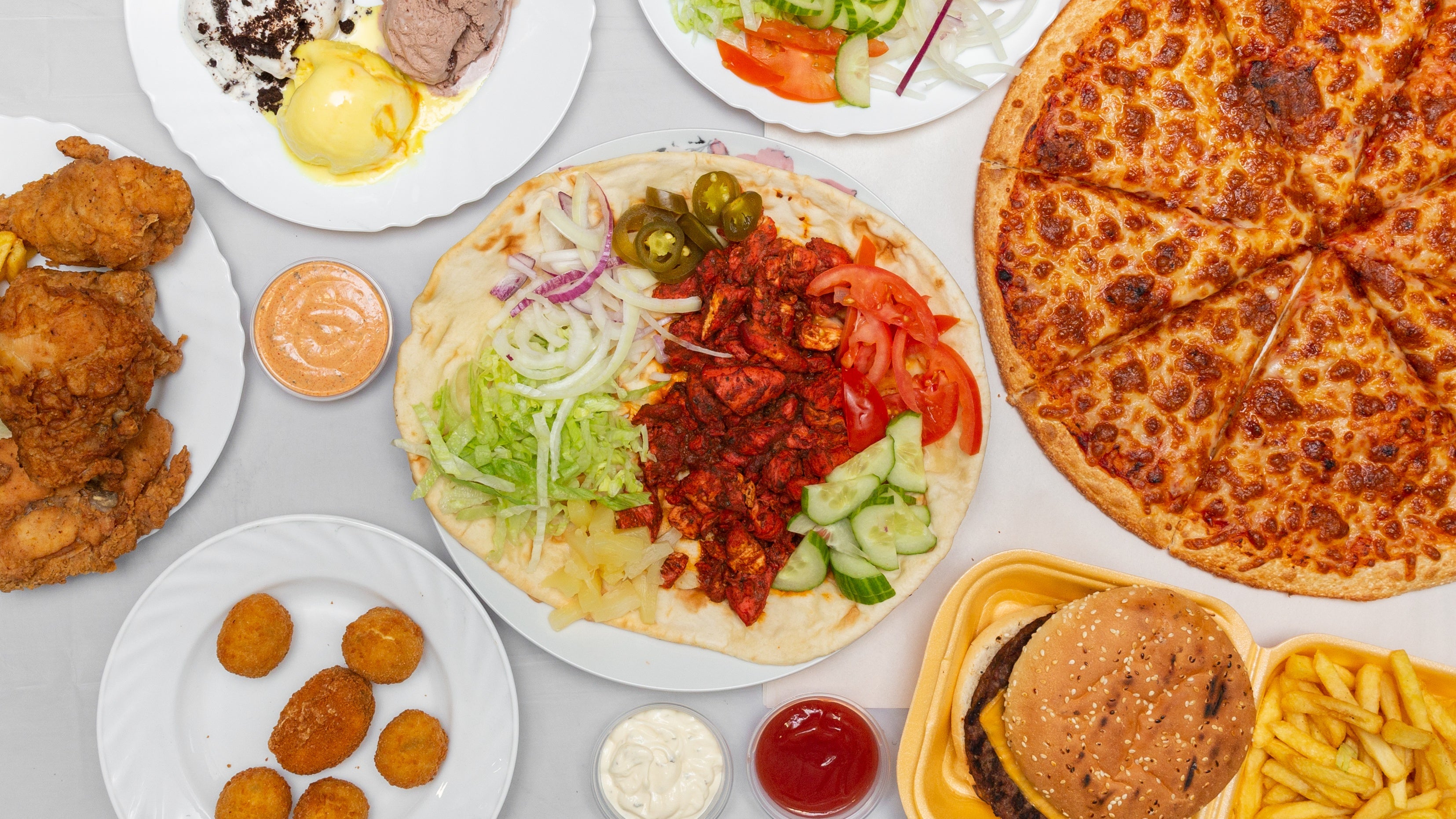 Bits N Pizza delivery from Heywood Order with Deliveroo