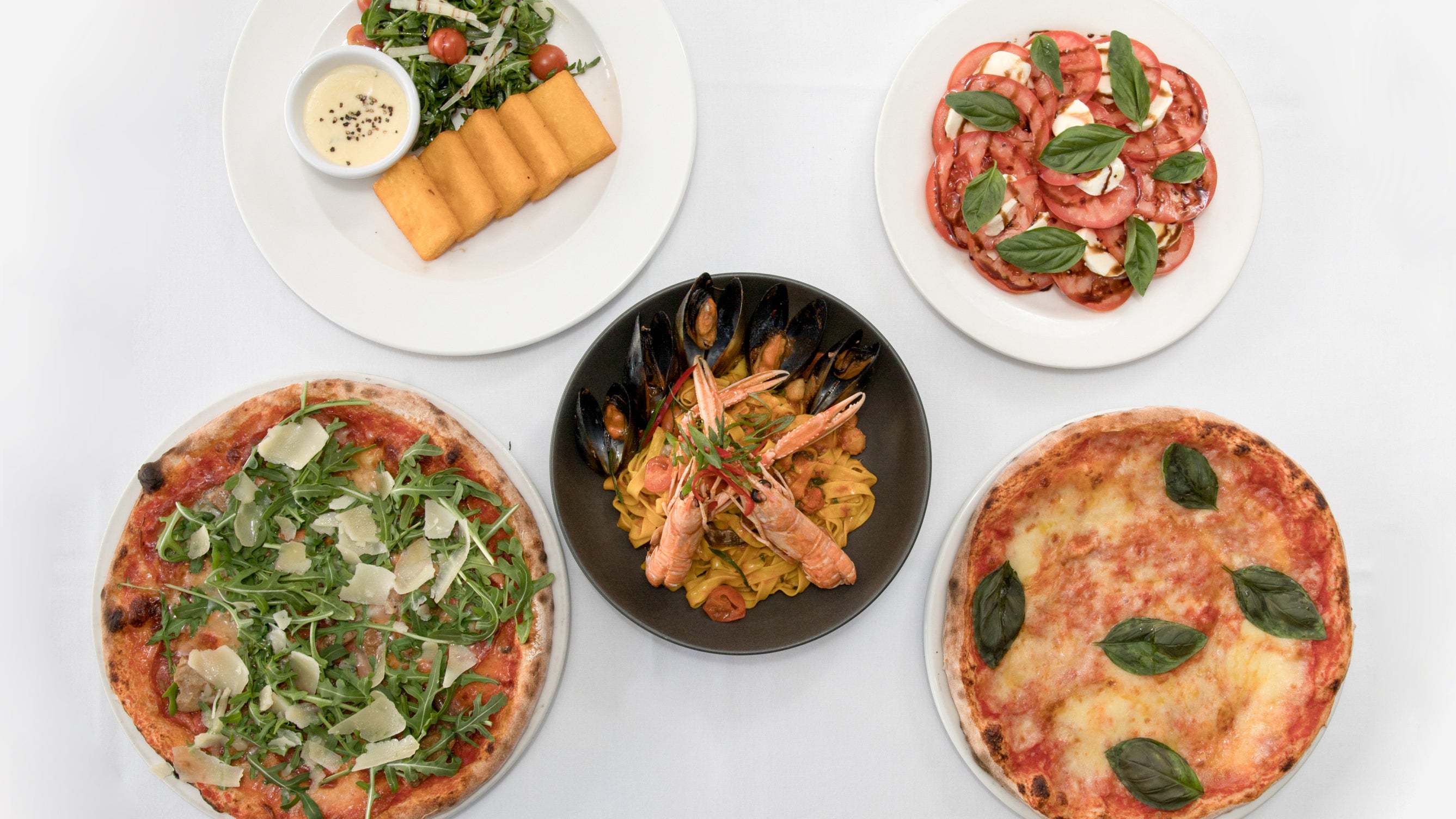 Mancini's Original Woodfired Pizza delivery from Belfield Order with